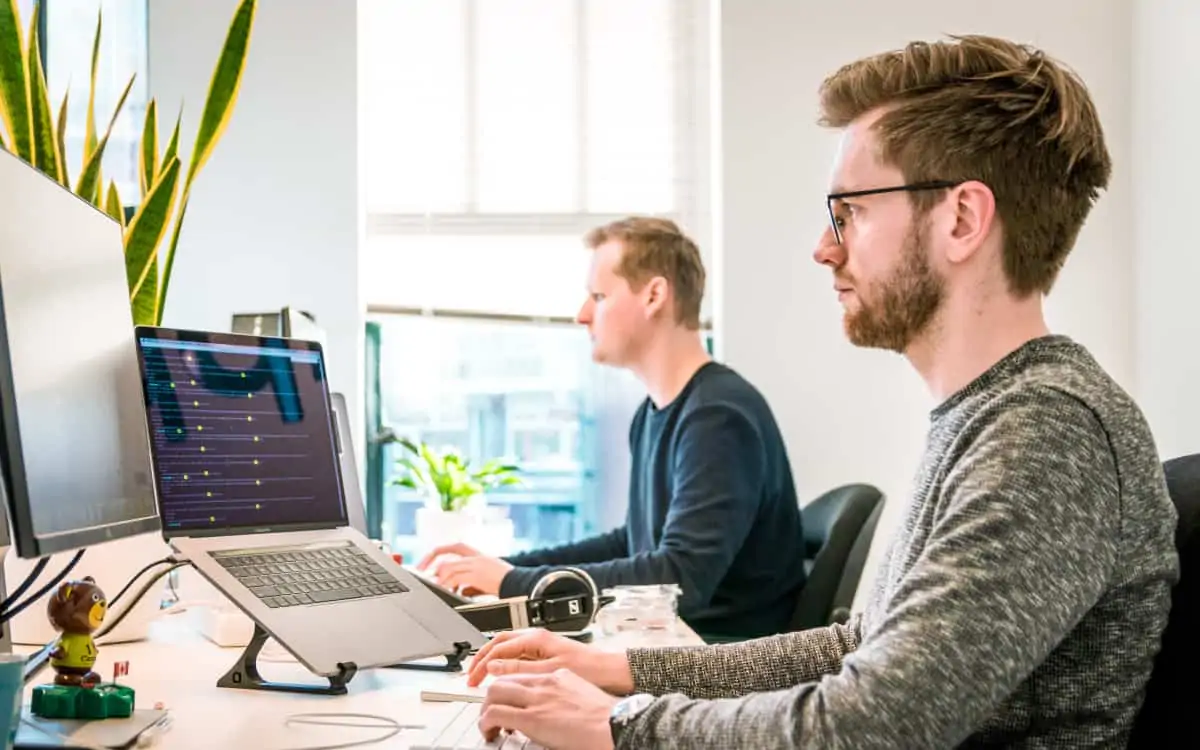 People in front of computer